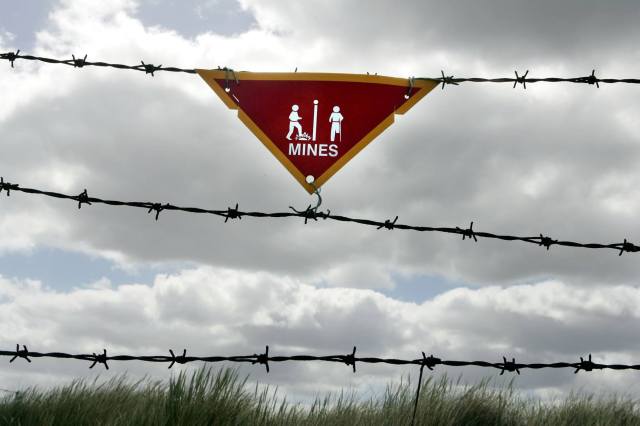 A sign warns of a minefield on the Falkland Islands.  Cathal McNaughton/PA Archive/PA Images