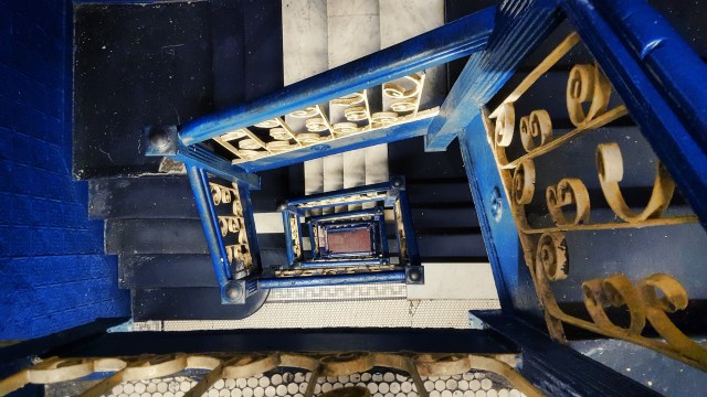 Steep staircase inside tenement building in the East Village, New York City. Getty.