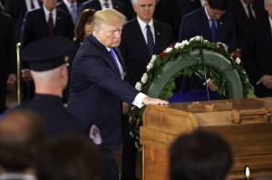 Trump's moment of mourning is part of a furious political game