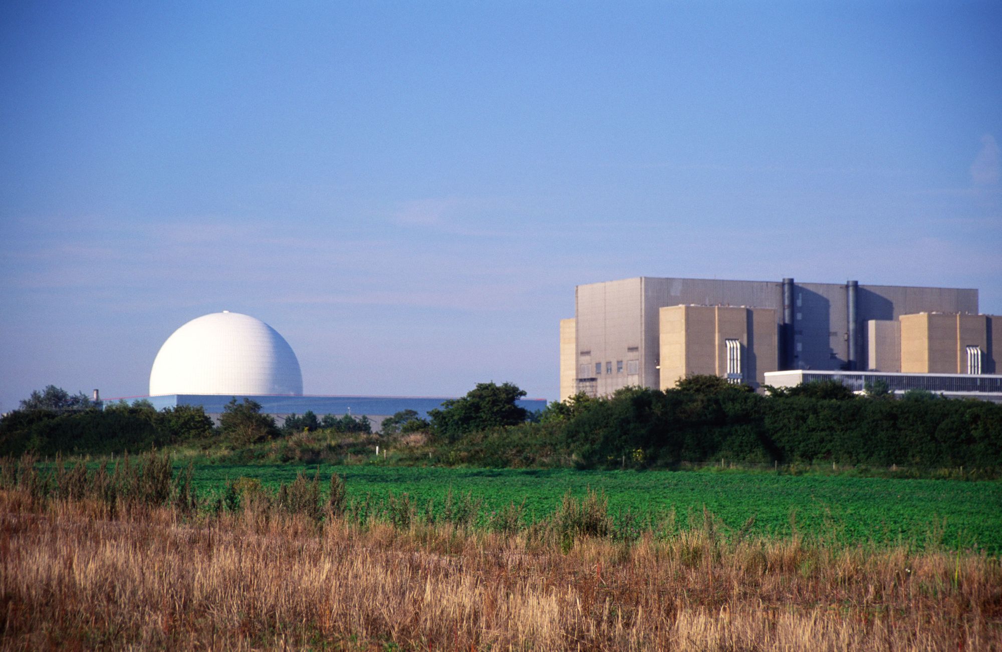 Sizewell nuclear power station Suffolk England UK, to the right is decommissioned Sizewell A the dome is the PWR of Sizewell B. (Photo by: Geography Photos/Universal Images Group via Getty Images)