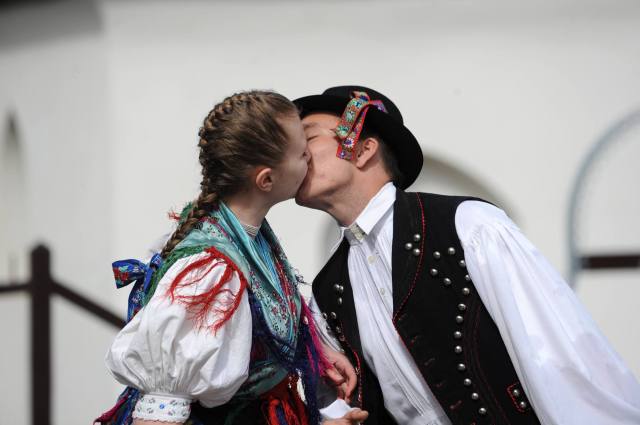 A young couple at Hungary's traditional Easter fertility festival. But can government get people in the mood? (Photo: ATTILA KISBENEDEK/AFP/Getty Images)