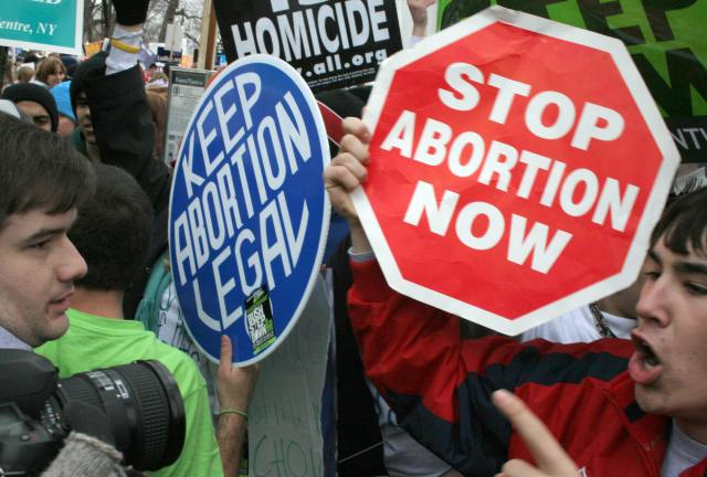 Pro-life demonstrators confront pro-choice counterparts. Credit: Karen Bleier/AFP/Getty