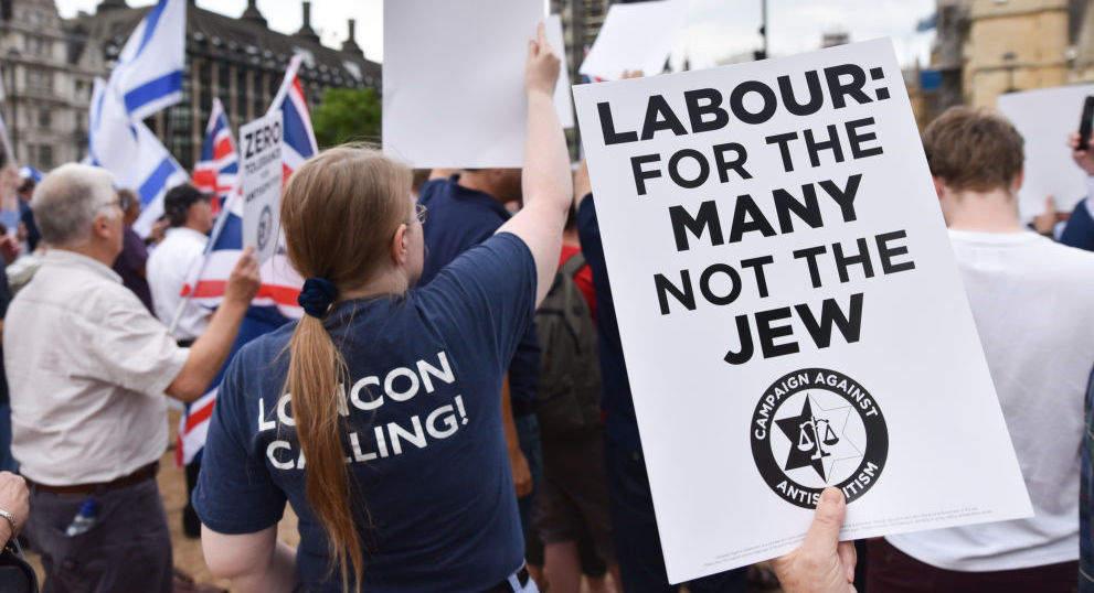 People protesting against antisemitism in the Labour Party in Parliament Square. Credit: Getty