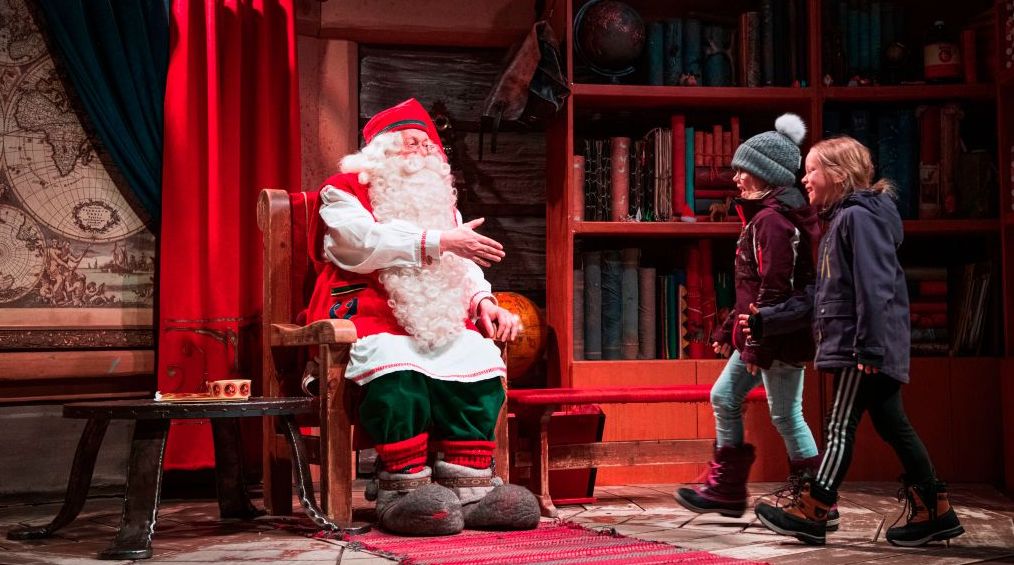 Santa Claus meets with children at his office near Rovaniemi, Finnish Lapland.(Photo by Jonathan Nackstrand via Getty Images).