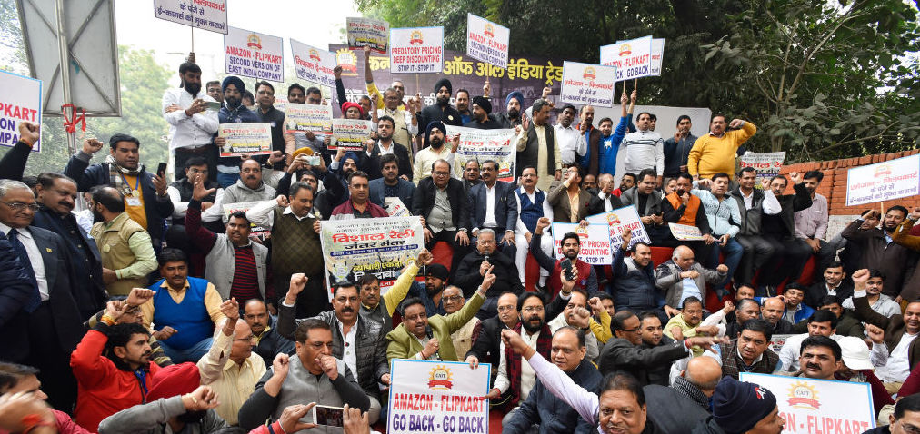 Indian small business owners are mobilising in protest against Amazon’s ambitions to expand deeper into Indian markets (Photo by Sanjeev Verma/Hindustan Times via Getty Images).