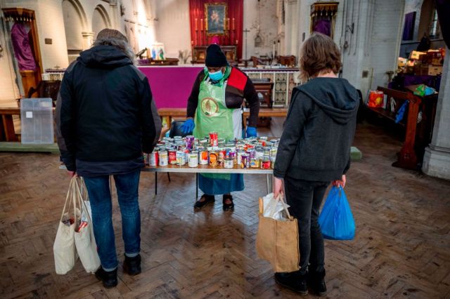 A Covid-19 food bank at St Margaret's Church in Leytonstone. Credit: Tolga AKMEN / AFP / Getty