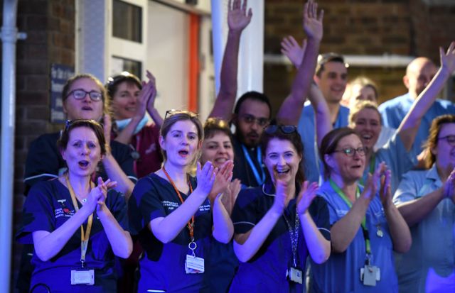 NHS staff from Dorset County Hospital are applaud (Photo by Finnbarr Webster/Getty Images)
