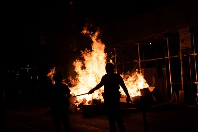 An anti police brutality march in Manhattan ends in flames. Credit: Braulio Jatar/SOPA Images/LightRocket/