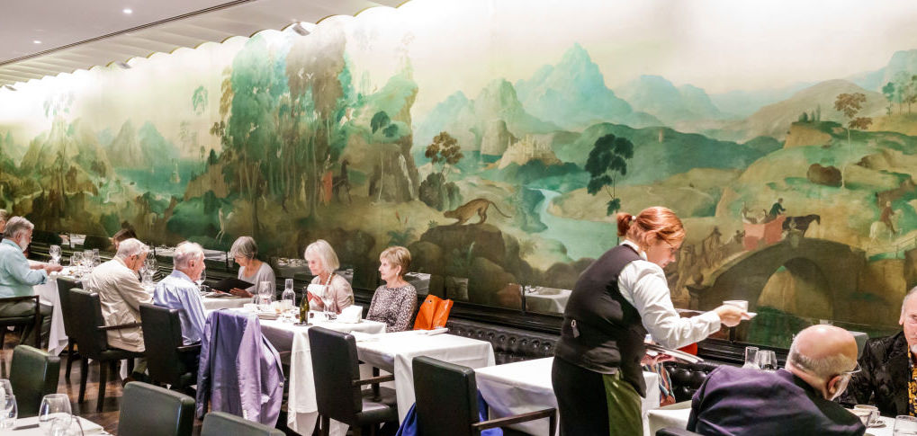 The Rex Whistler Restaurant featuring the 'The Expedition in Pursuit of Rare Meats' mural. Credit: Getty
