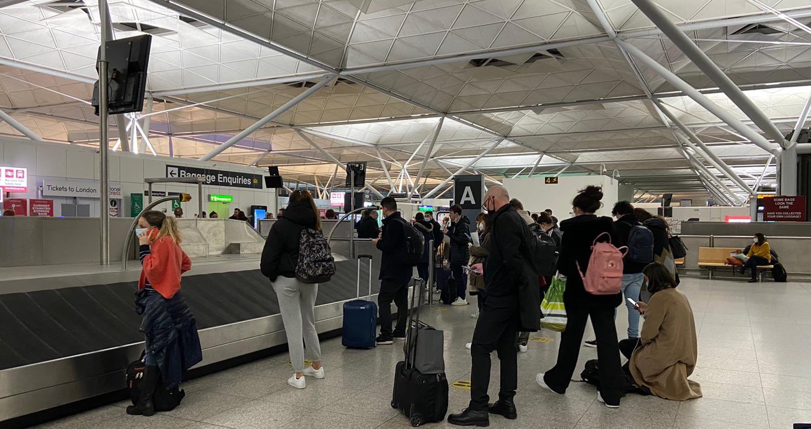 Stranded passengers collect their luggage at Stansted Aiport. Credit: Beatrice Guzzardi