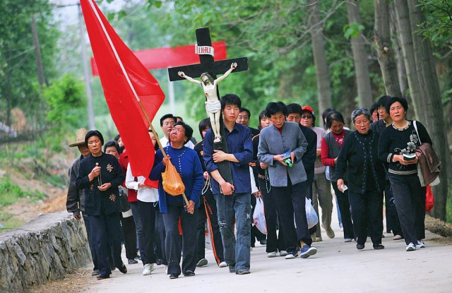 A procession of Chinese Catholics. (Photo by China Photos/Getty Images)