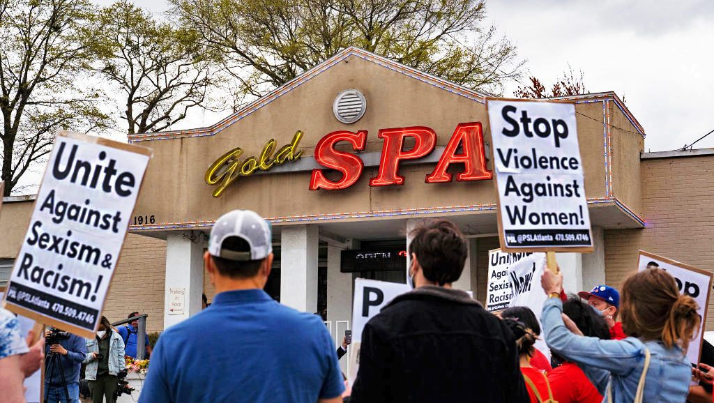 Activists demonstrate outside Gold Spa following Tuesday night's shooting. Credit: Getty