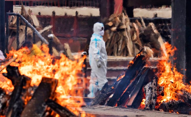 The last rites in New Delhi, India. Credit: Anindito Mukherjee/Getty 