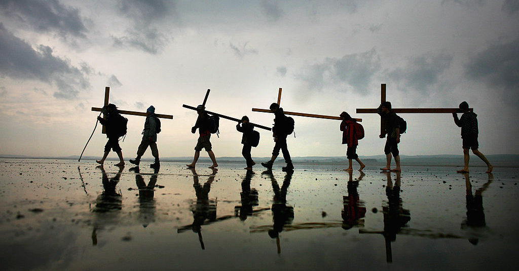 Pilgrims in Northumbria, where the holy history owes much to Irish missionaries. Credit: Jeff J Mitchell/Getty Images