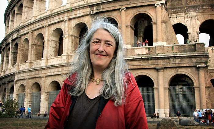 Mary Beard next to the Coliseum in Rome while filming with the BBC. Photograph: Caterina Turroni/BBC