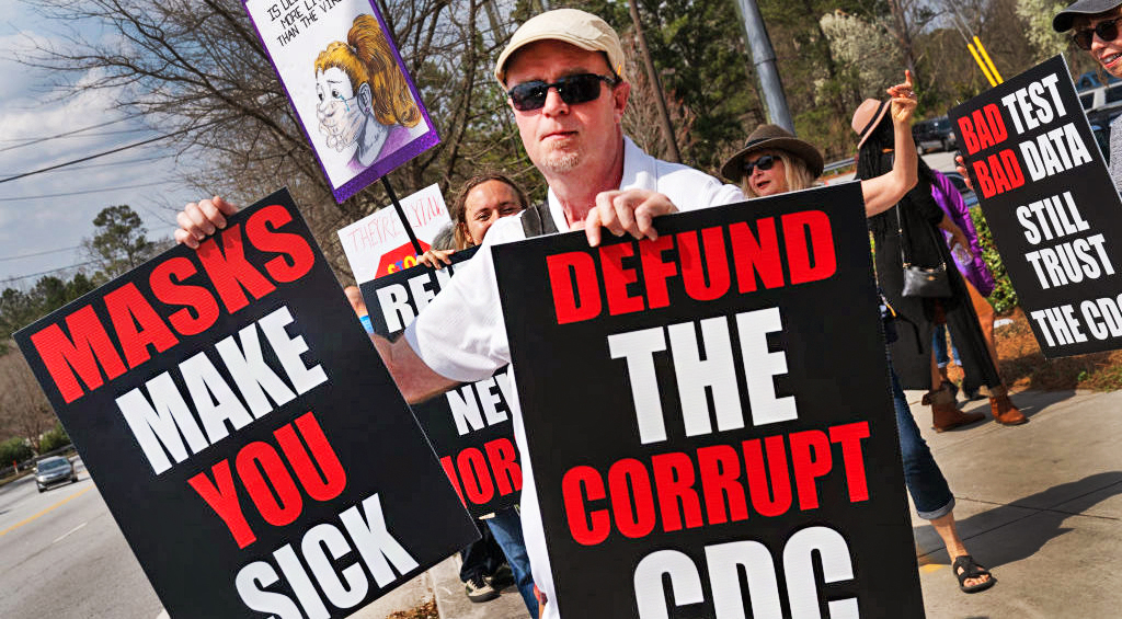 A protestor against masks and vaccines in Atalanta last year. (Photo by Elijah Nouvelage/Getty Images)
