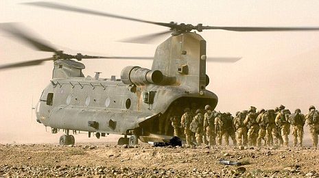 British troops board a Chinook helicopter in Helmand