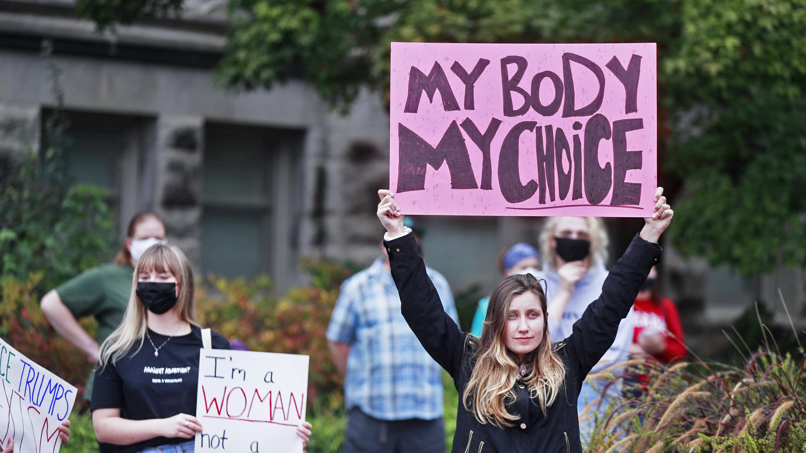 A demonstrator holds a placard saying "My Body My Choice" in Indiana. Credit: Getty