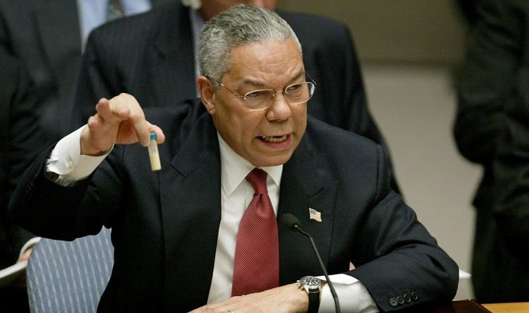 US Secretary of State Colin Powell holds up a vial that he described as one that could contain anthrax during a UN meeting.