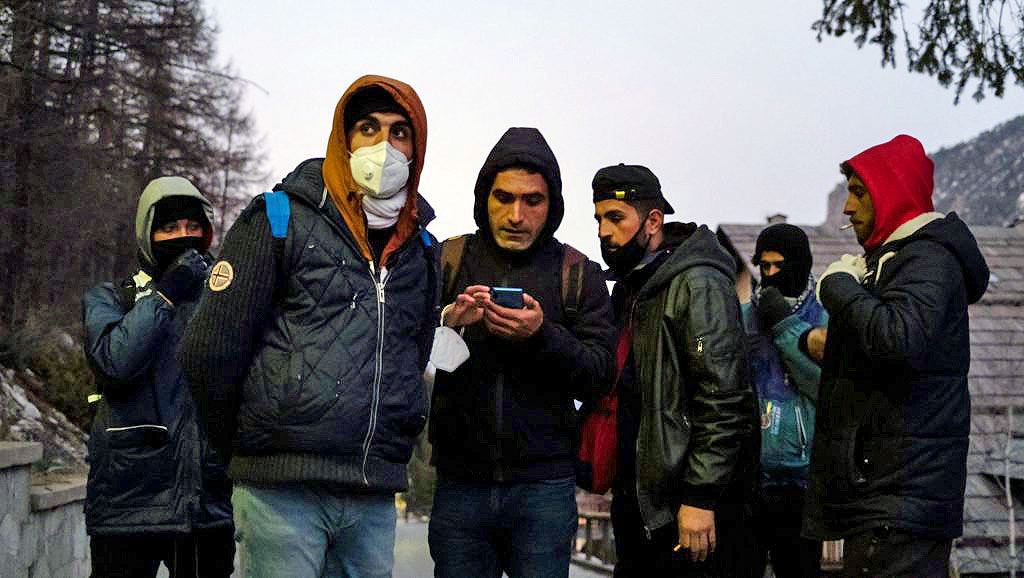Kurdish migrants near the French border in Western Italy earlier this year. 