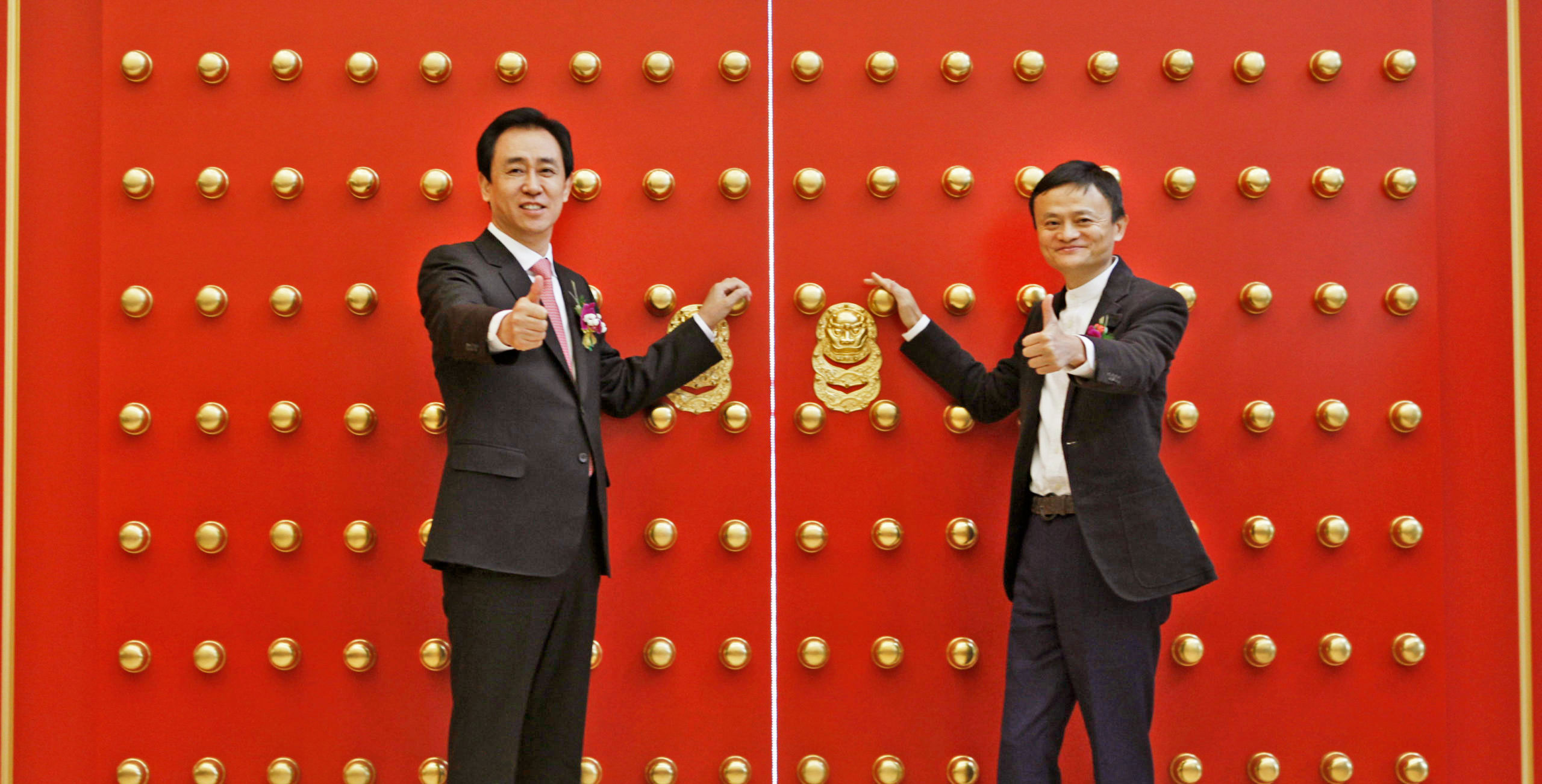 Jack Ma (R), chairman of Alibaba Group, and Xu Jiayin, chairman of Evergrande. Credit: Getty