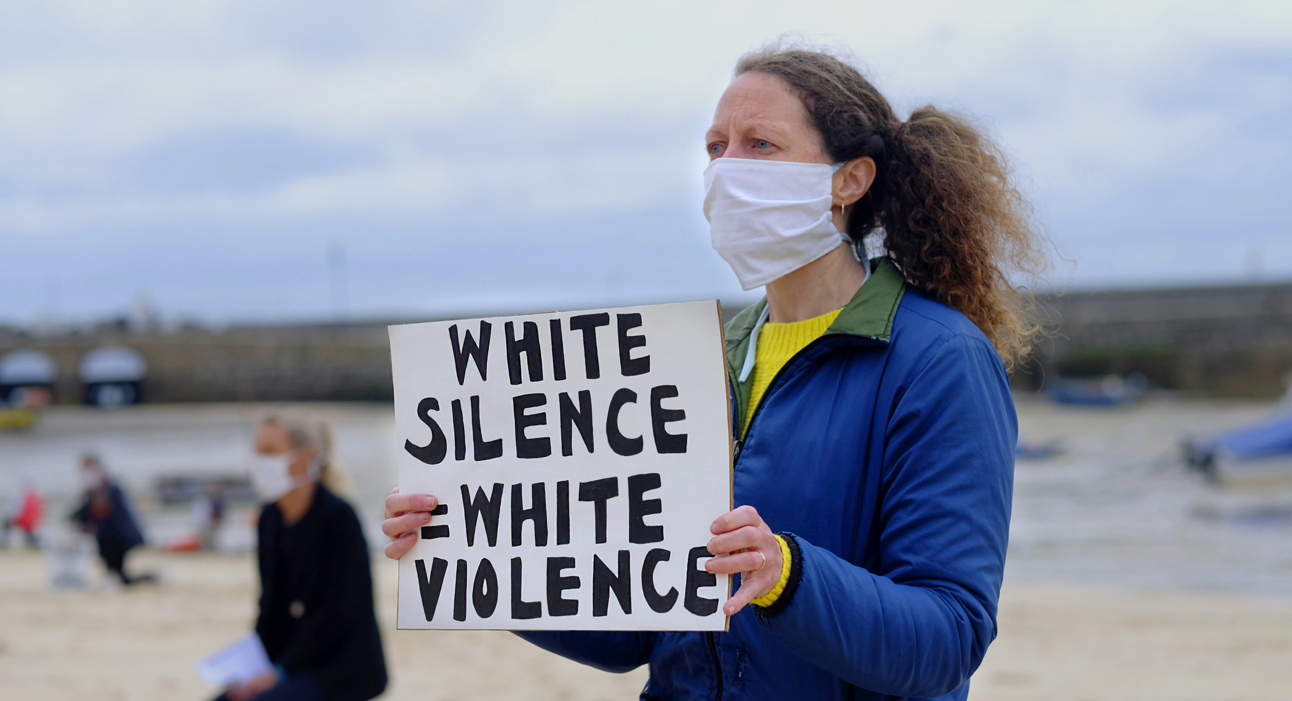 Her boyfriend is out of shot, pretending to be woke. (photo by Gav Goulder/In Pictures via Getty Images)