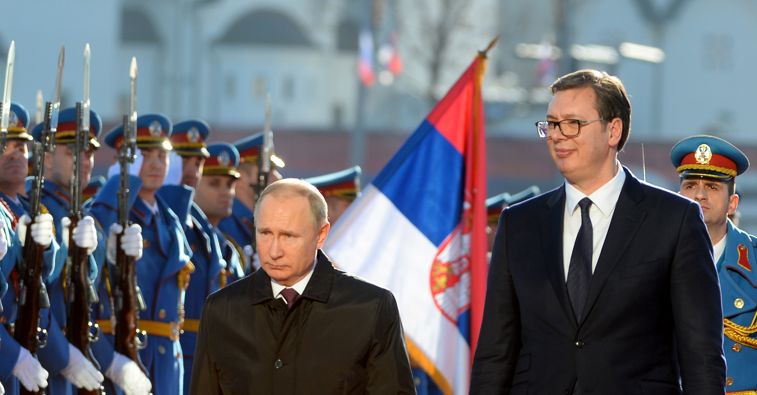 Vladimir Putin (L) and Serbian President Aleksandar Vučić (R)