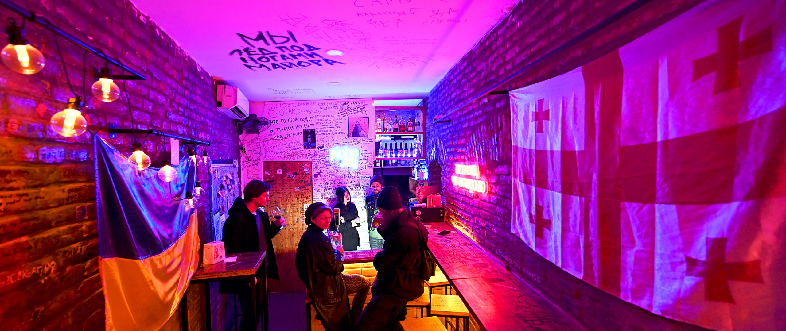 One Tbilisi bar displays its loyalties on its walls. Credit: Getty