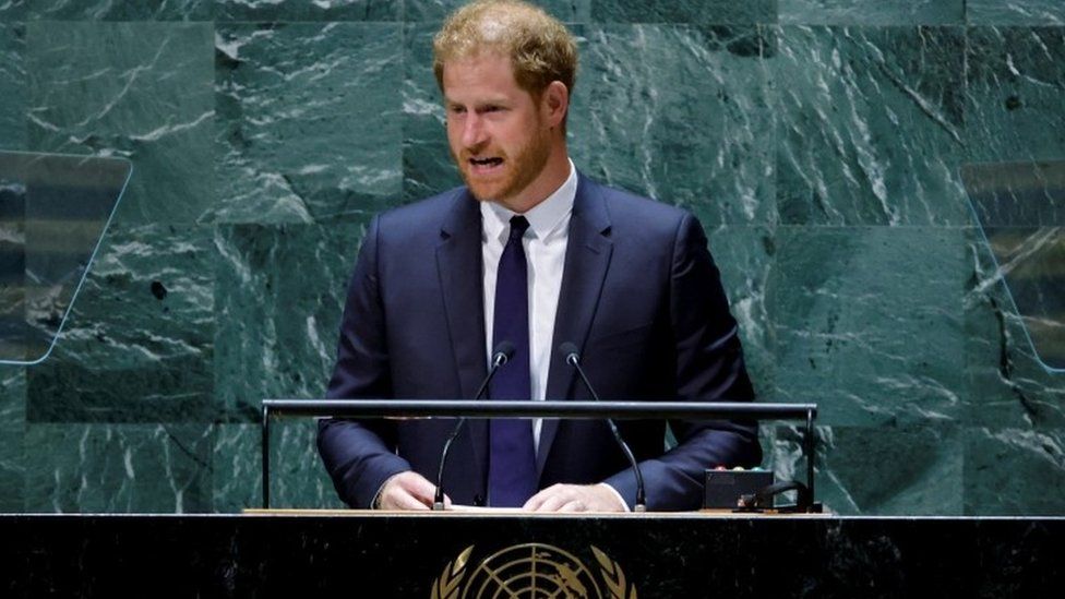 Why does this man have a microphone? 