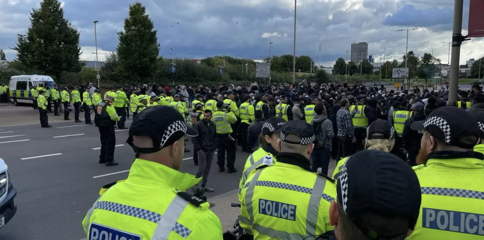 Police and protesters in Belgrave Road on Sunday afternoon
