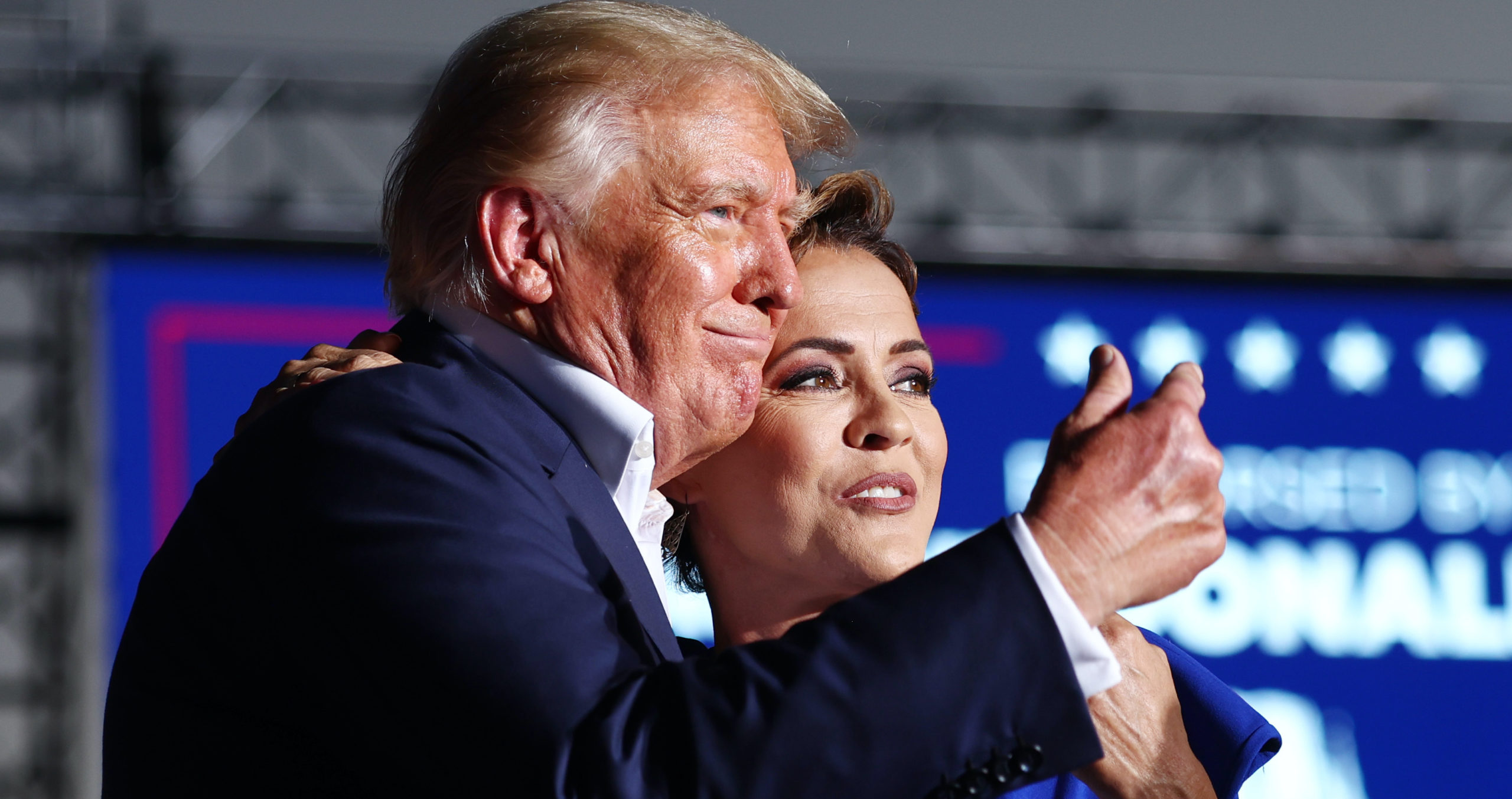 Former U.S. President Donald Trump embraces Arizona Republican gubernatorial nominee Kari Lake