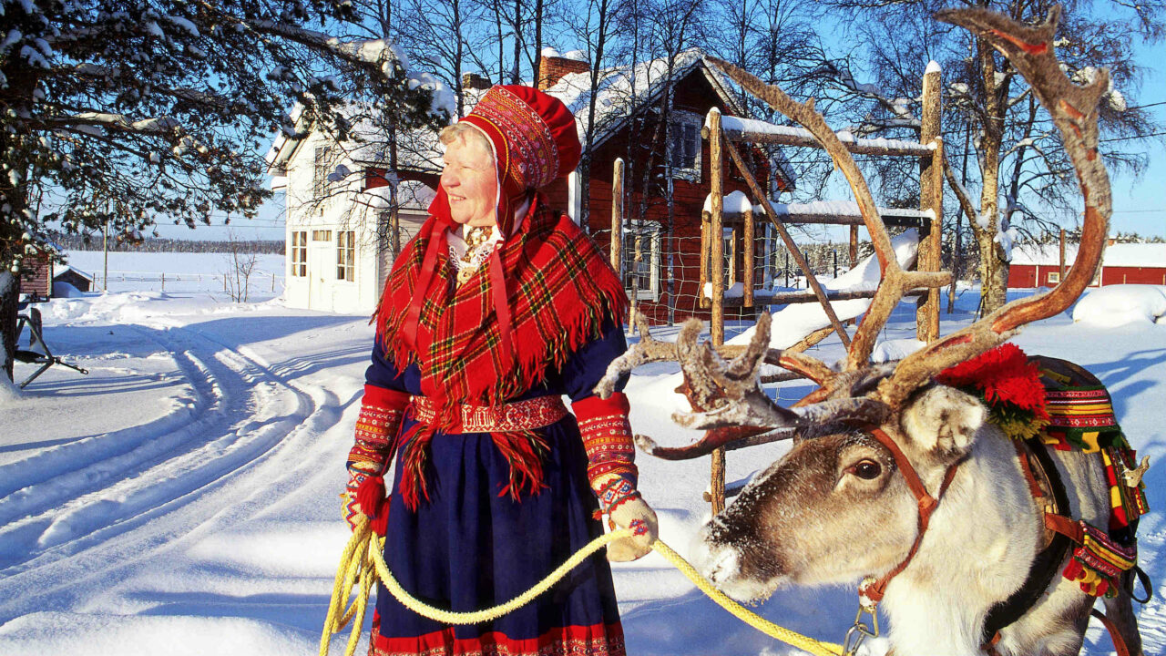 A woman in traditional Sami attire.