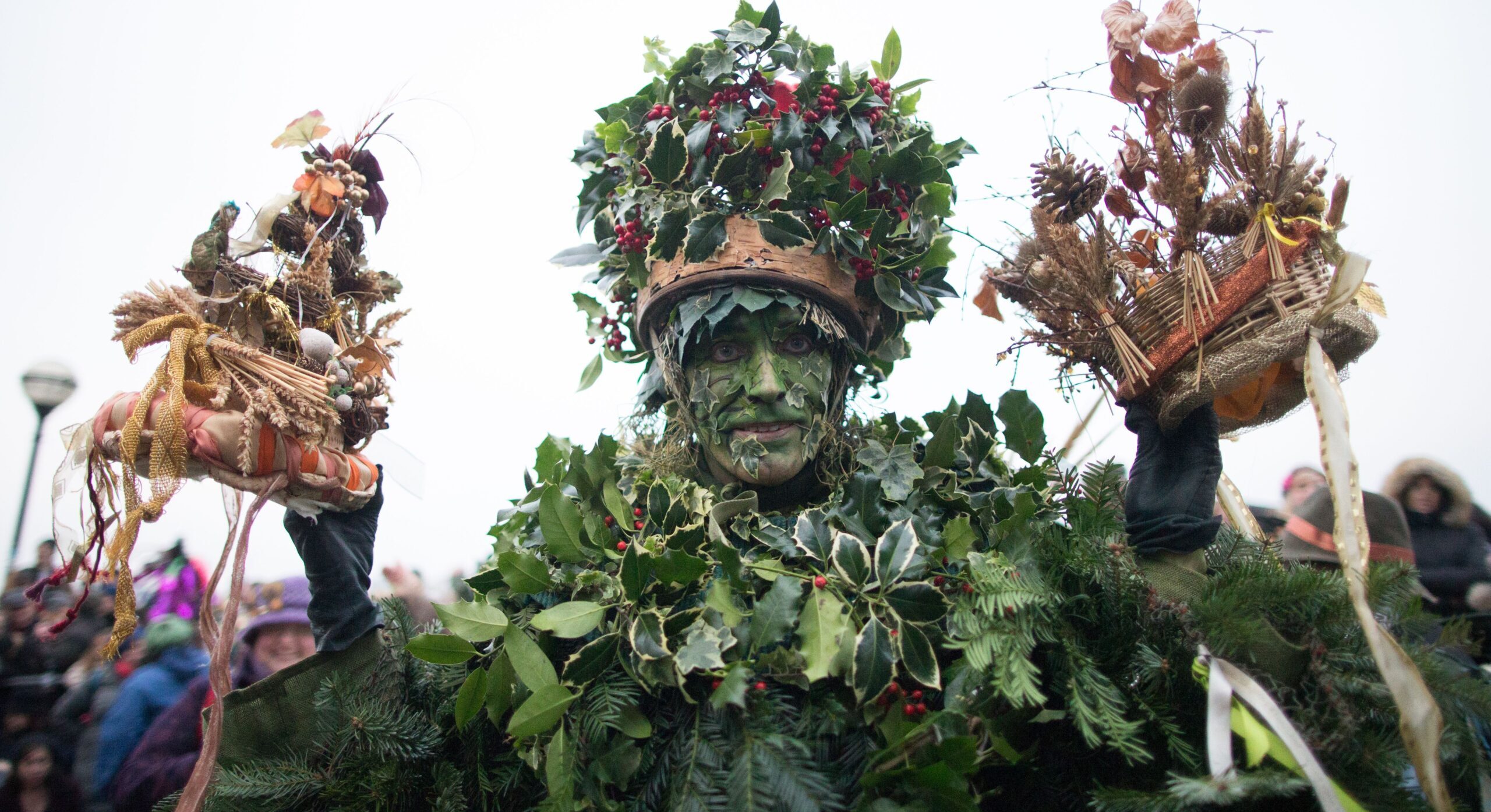 An actor dressed as the Holly Man, the winter guise of the Green Man. Credit: Getty 