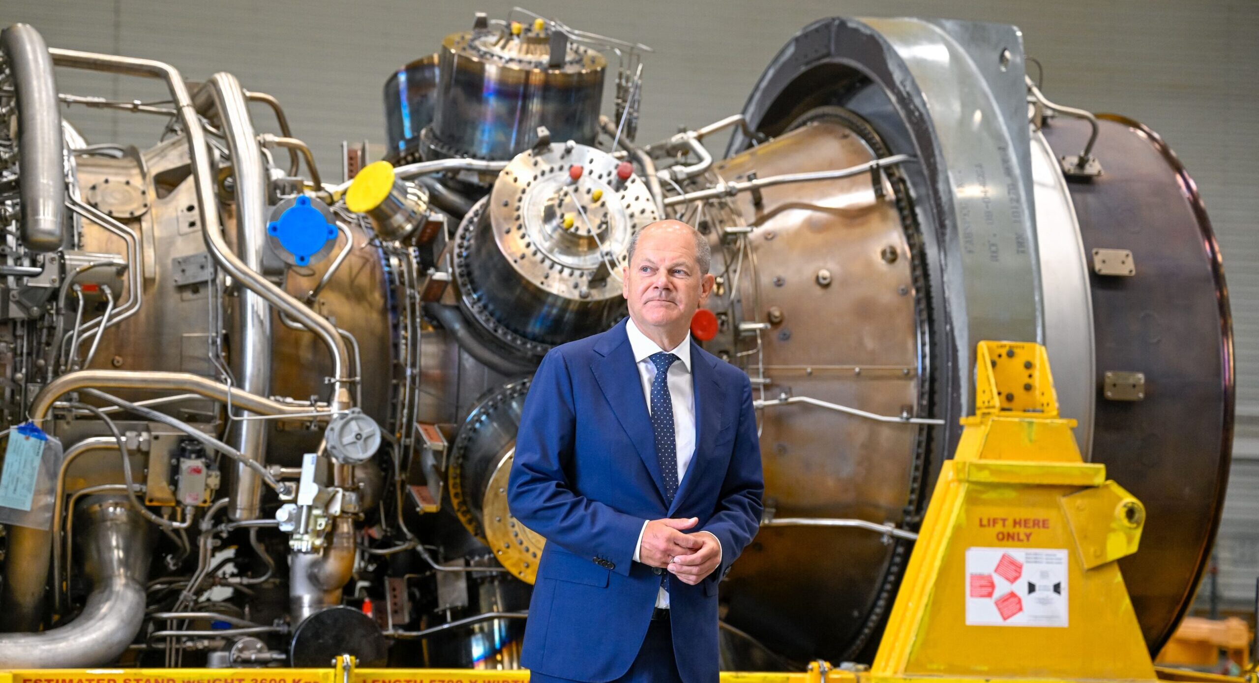 Olaf Scholz stands in front of a turbine of the Nord Stream 1 pipeline last year. Credit: Getty
