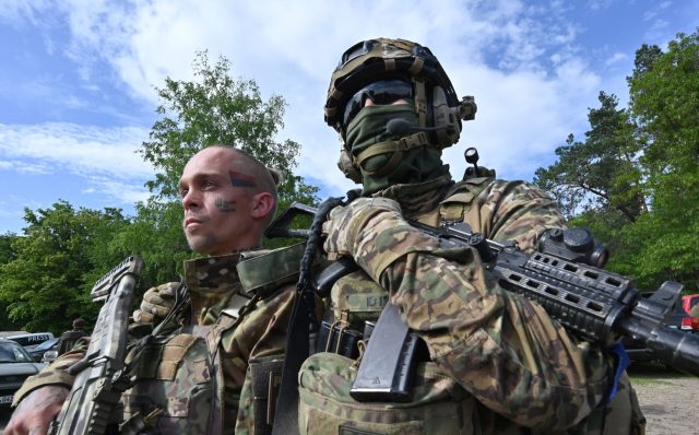 Fighters of the Russian Volunteer Corps (SERGEY BOBOK/AFP via Getty Images)
