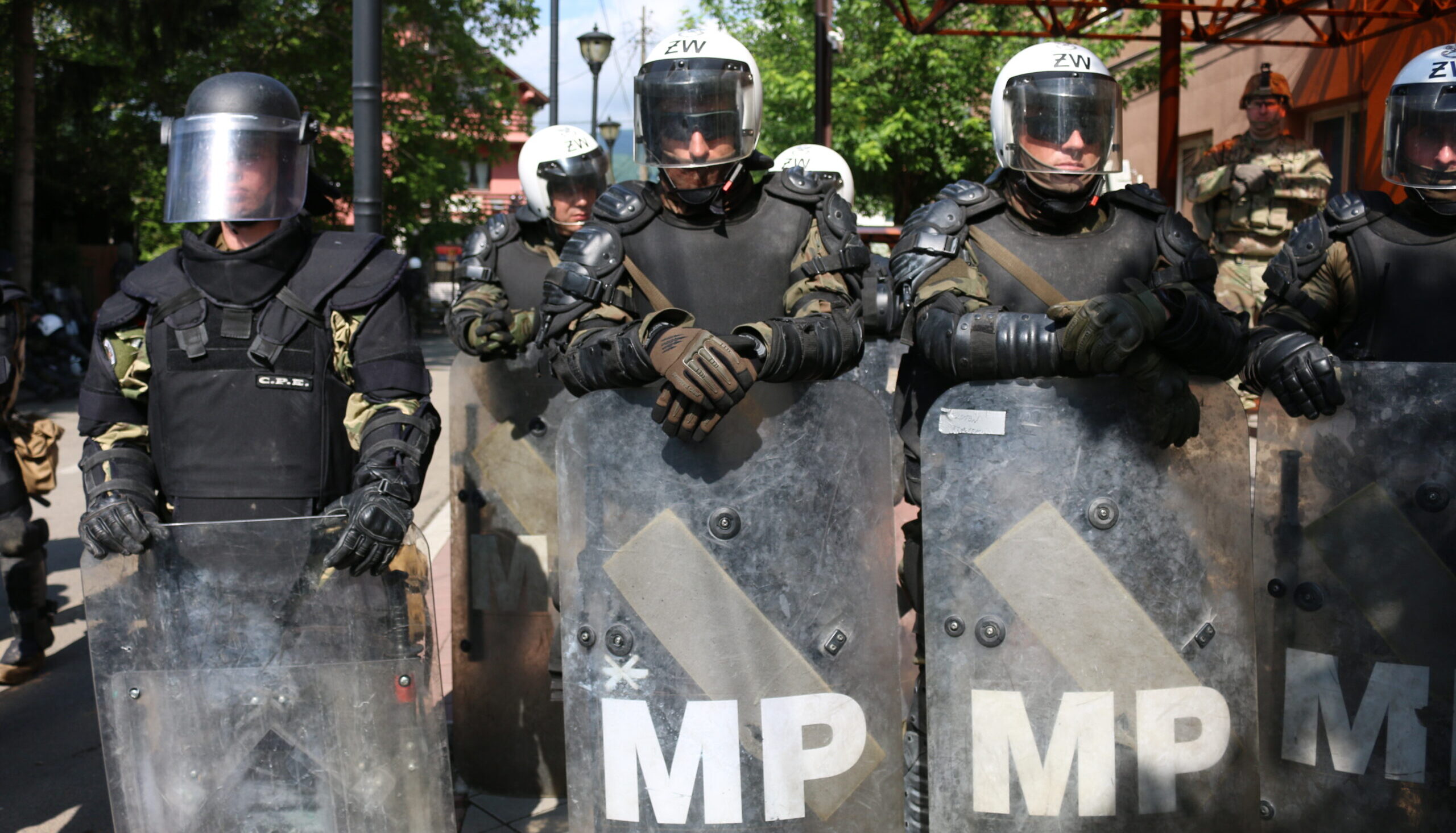 Kosovo police protect the municipality building in Mitrovica amid protests this week. Credit: Getty