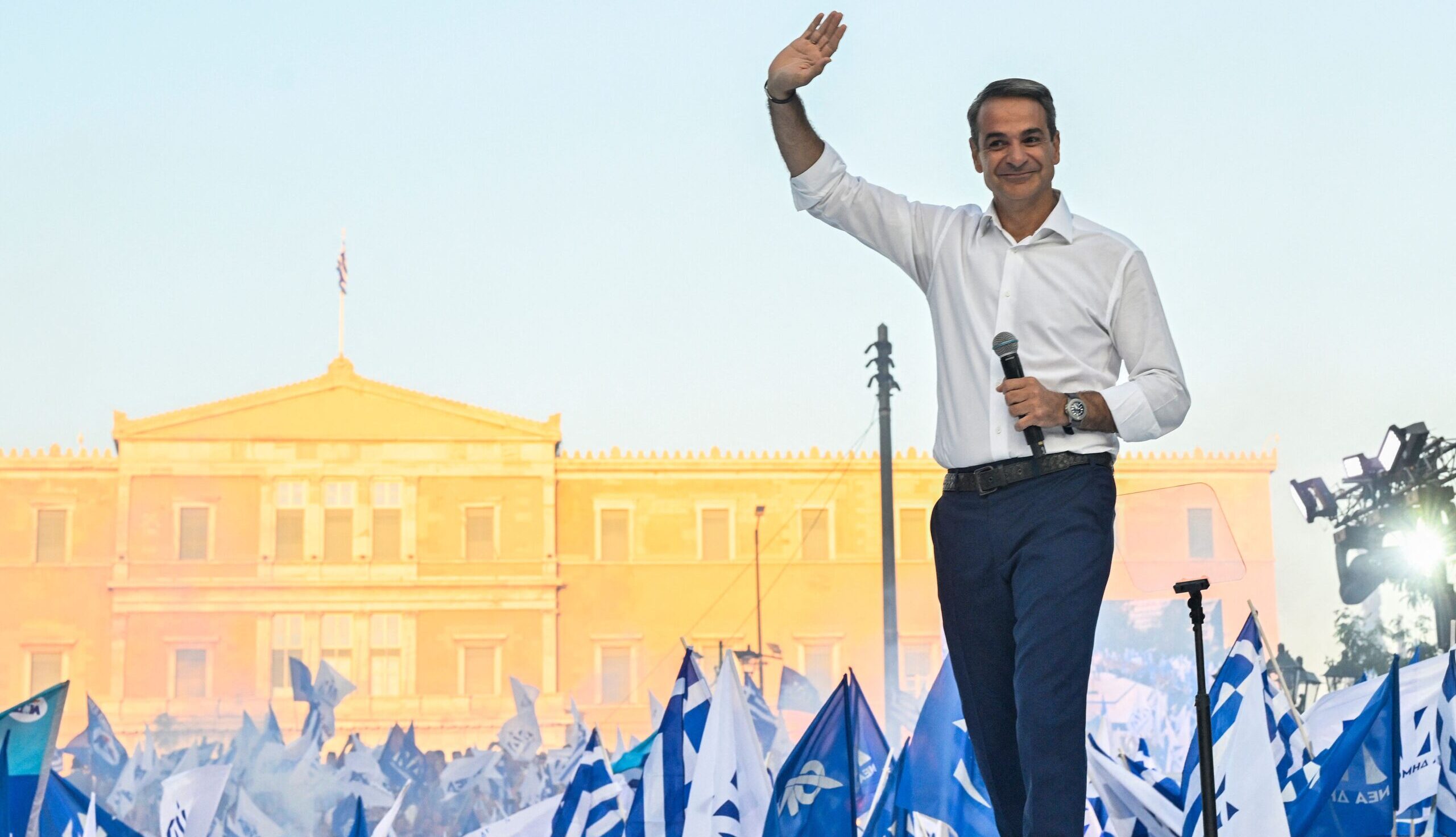 Greek Prime Minister Kyriakos Mitsotakis waves to supporters ahead of the election. Credit: Getty