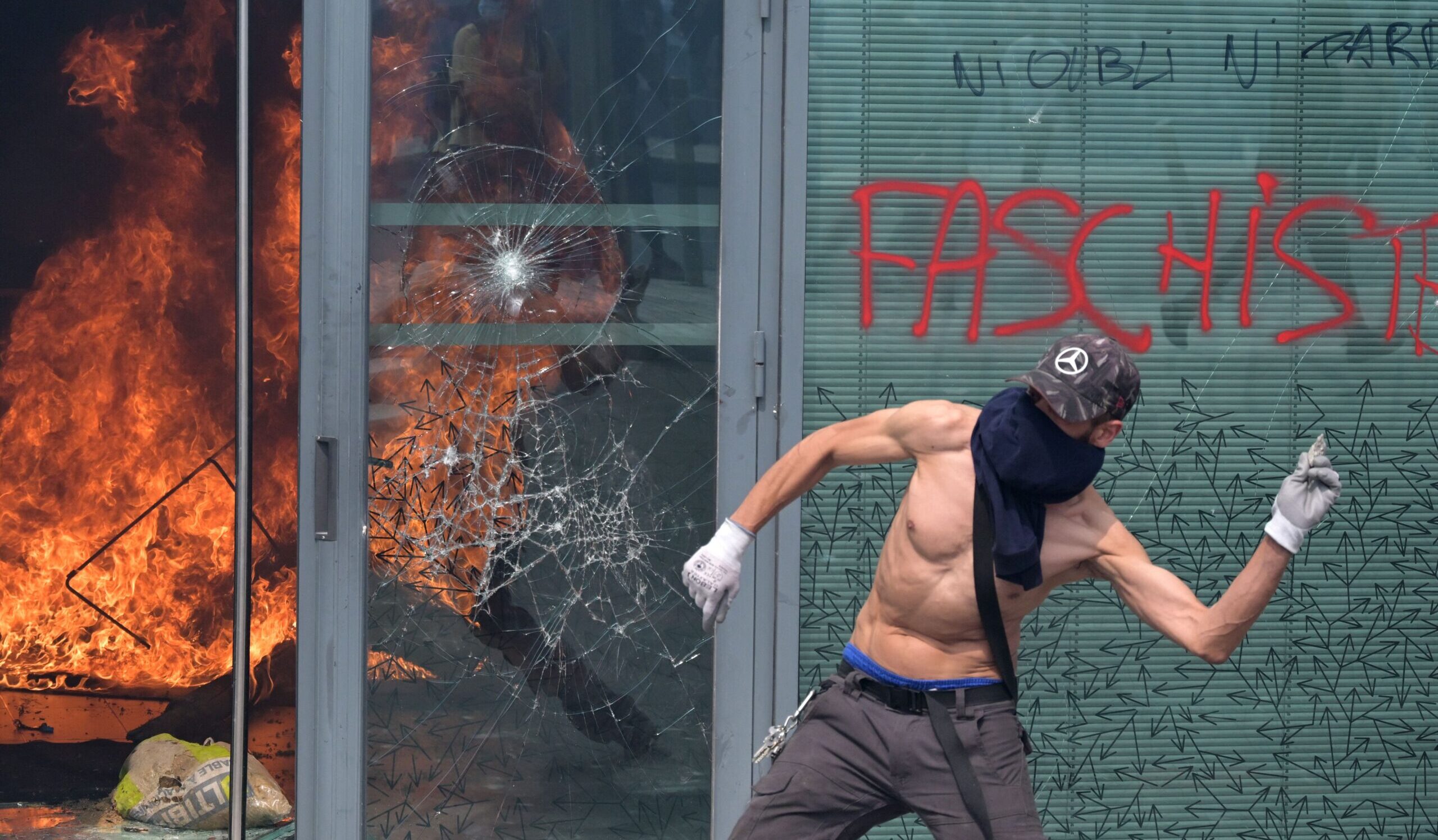 A protester clashes with police during a commemoration march for Nahel Merzouk last week. Credit: Getty