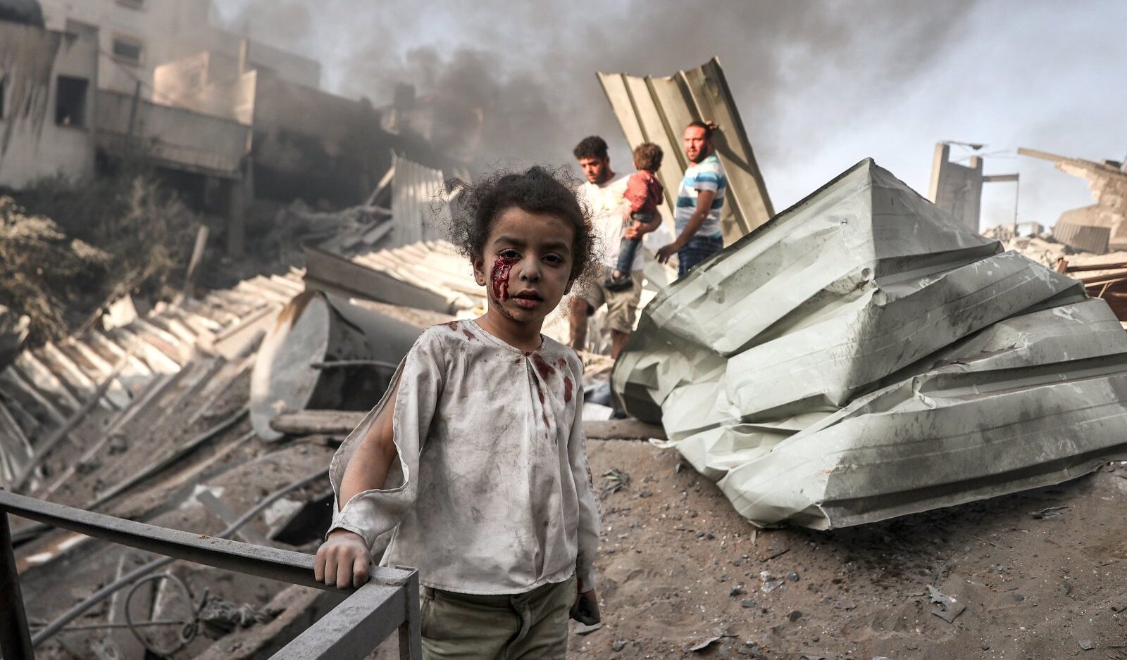 A Palestinian child in the aftermath of an Israeli bombing. Credit: Getty