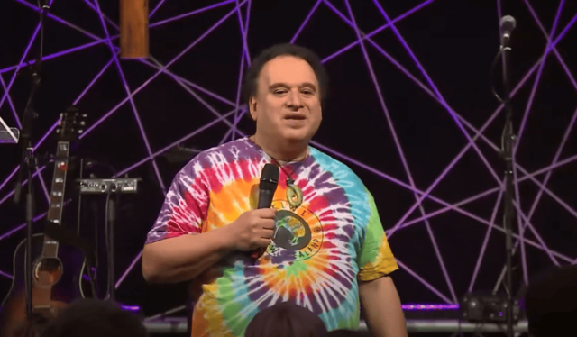 'He first invites the Holy Spirit into the room.' Credit: YouTube