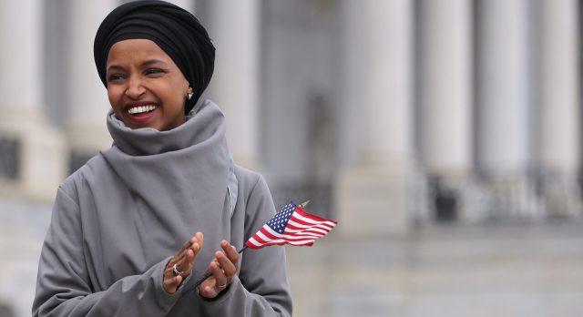 Ilhan Omar demonstrates her patriotism. Credit: Getty