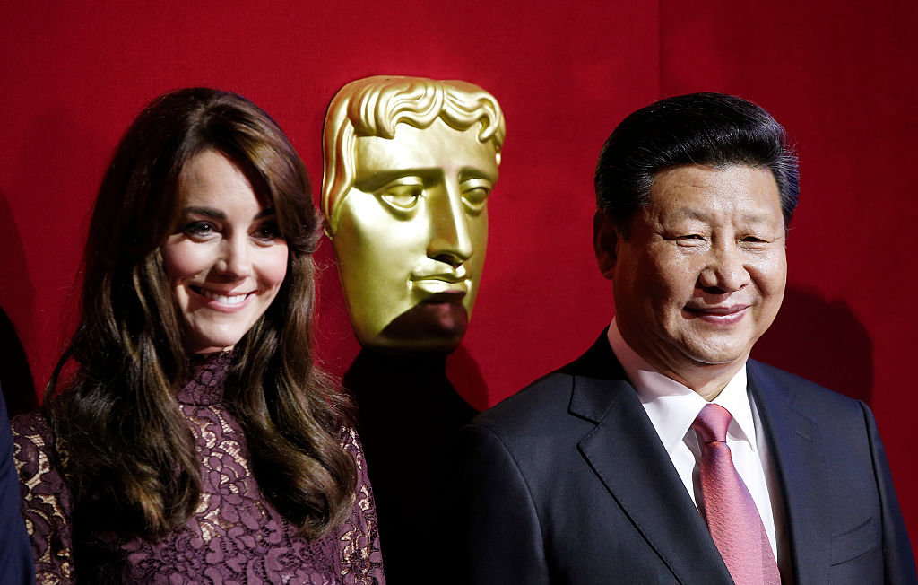 The Princess pictured with Kate truther and Chinese leader Xi Jinping. Credit: Getty