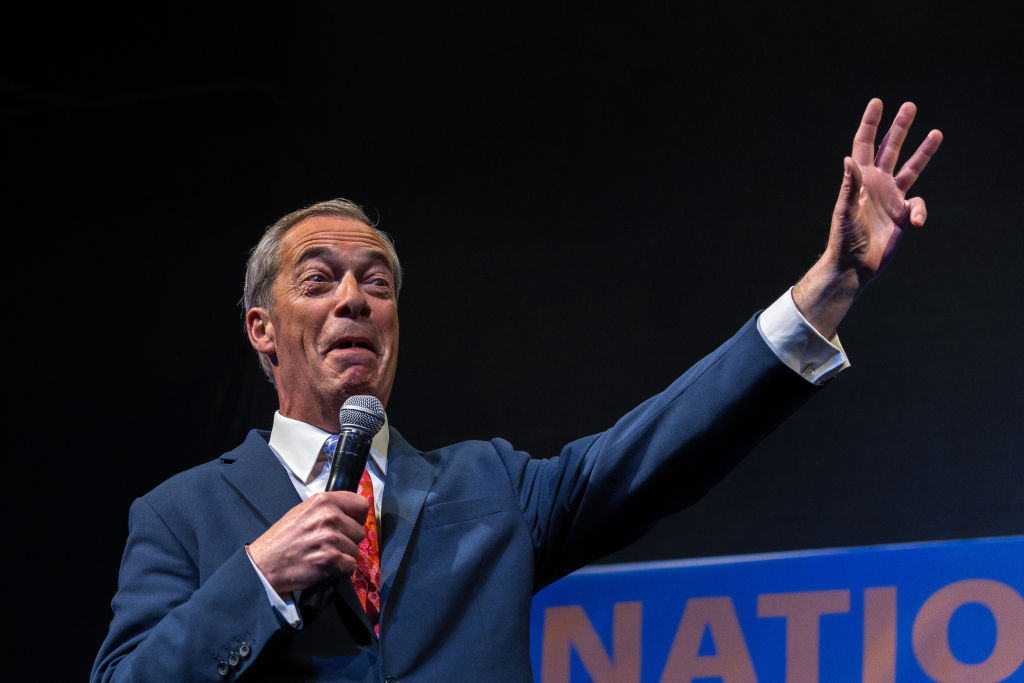 Nigel Farage speaks at NatCon Brussels this morning. Credit: Getty