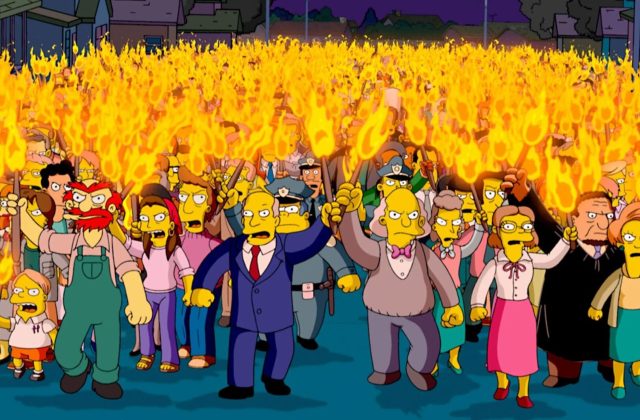 'Debate on contested issues has given way to blame, shame, and hectoring. Speakers are shouted down and chased from the podium.' (Credit: The Simpsons Movie/20th Century Fox)