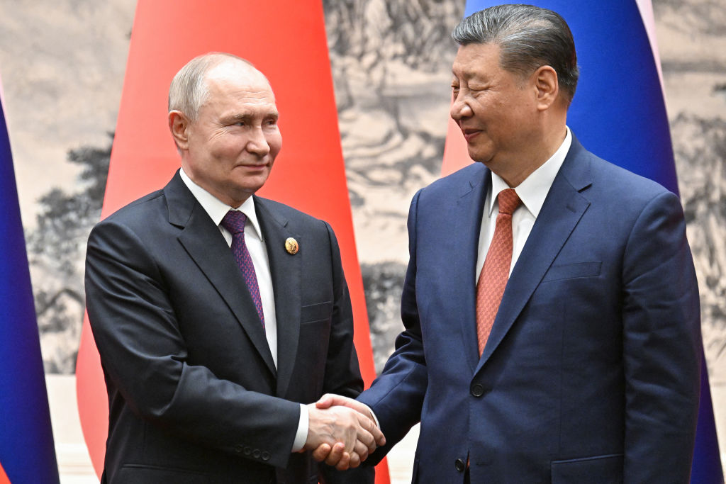 Vladimir Putin and Xi Jinping meet in Beijing last week. Credit: Getty