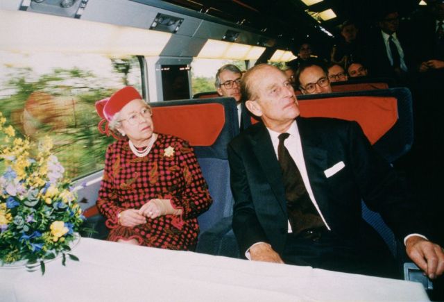 'The Queen, dressed in red, travelled from London to Calais on board a brand new 16,000-hp Eurostar train, packed with VIPs, cantering at a stately 80mph' (Tim Graham Picture Library/Getty Images)