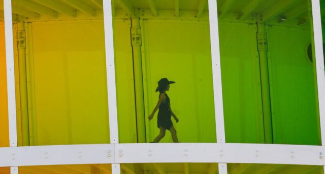 A festival-goer escapes the heat in an air-conditioned tower during Stagecoach Country Music Festival (Allen J. Schaben / Los Angeles Times via Getty Images)