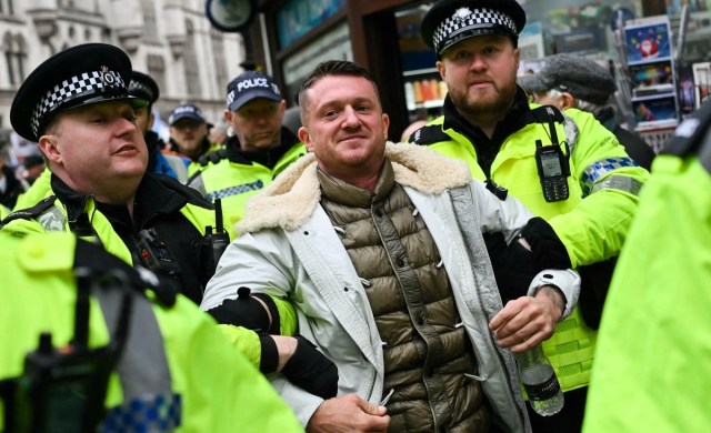 Robinson is arrested during a protest in 2023 (JUSTIN TALLIS/AFP via Getty Images)