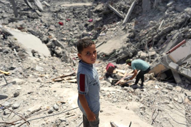 A young boy in Gaza following an Israeli strike last year. Credit: Getty