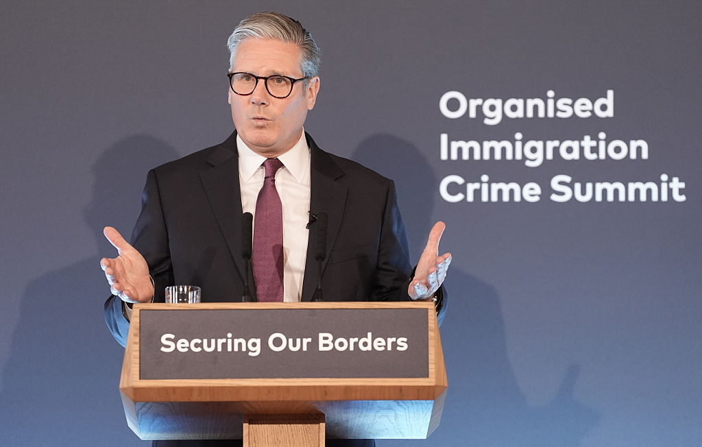 Keir Starmer speaks at the Organised Immigration Crime Summit in London yesterday. Credit: Getty